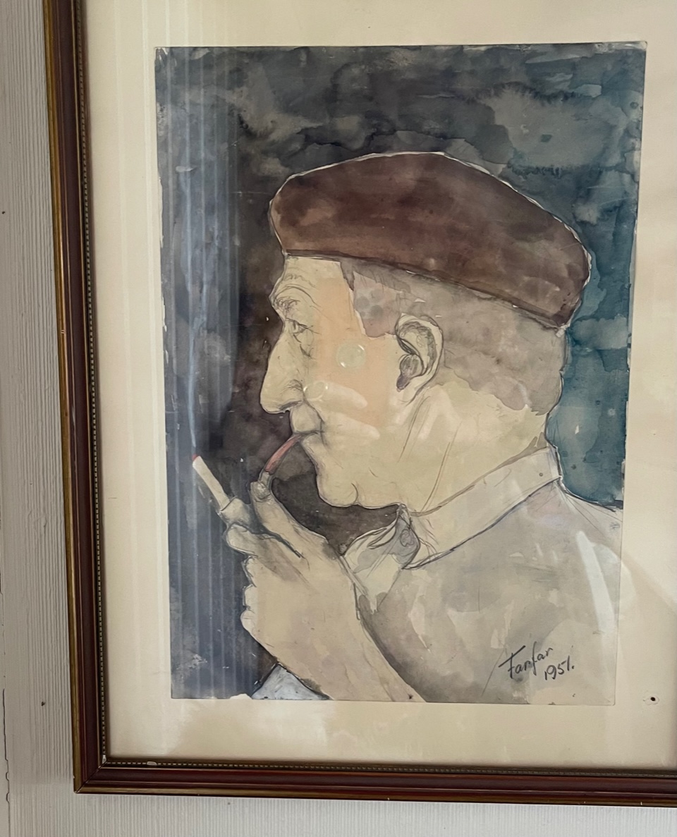 Bild på en tavla av man med pipa, målad 1957